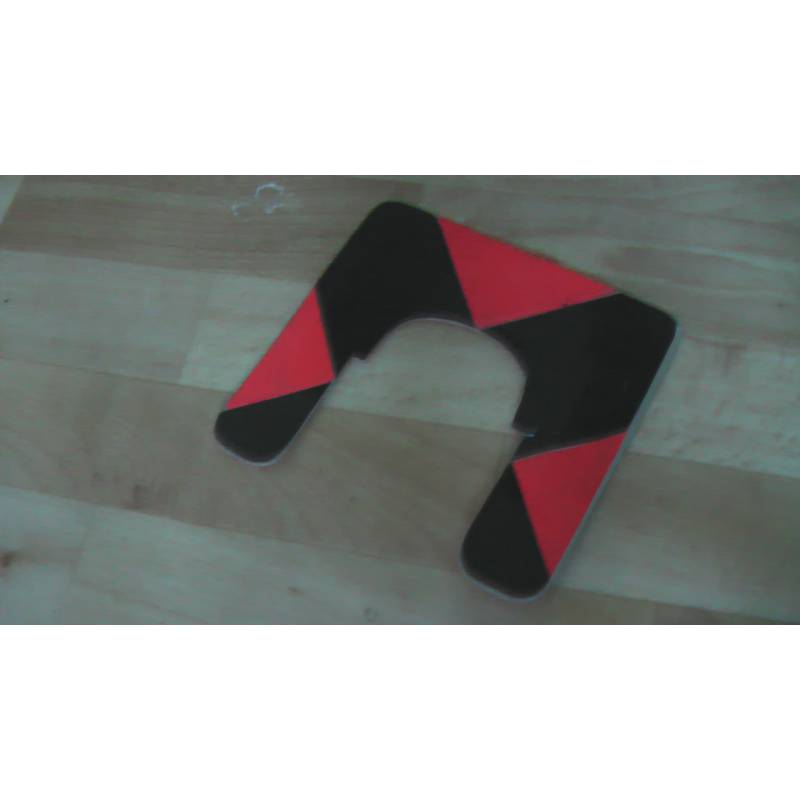 Př&iacute;davn&yacute; terč k hranolu s drž&aacute;kem, použit&yacute;